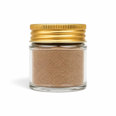 Black Winter Truffle powder made from Tuber brumale in a clear glass jar with a yellow lid