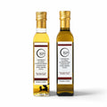 Two 250 ml bottles of Terra Ross black and white truffle-flavoured olive oil