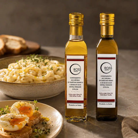 Black and white truffle-flavoured olive oil bottles served with warm savoury dishes