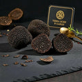 Малки пресни екземпляри от Tuber melanosporum с естествени вариации на клас B