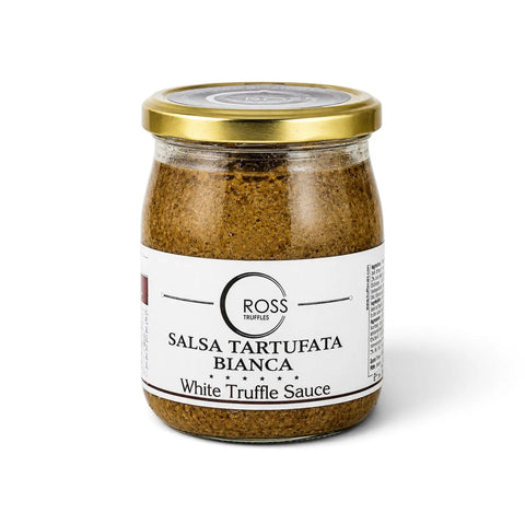 Glass jar of mushroom-based White Tartufata truffle sauce with 2% Tuber borchii