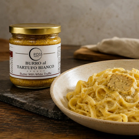 White truffle butter with Tuber borchii melting into warm creamy tagliatelle