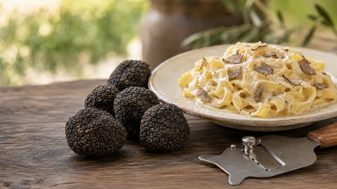 Fresh Tuber aestivum summer truffles served with a refined pasta dish
